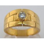 An 18 carat gold and single stone diamond ring, the central collet set brilliant approx. 0.20 carat,