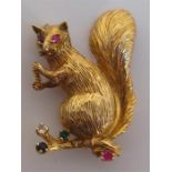 A 1960s 9 carat gold and gem set brooch, import marked London 1966, modelled as a squirrel and