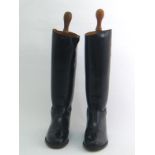 A pair of Regent black leather riding boots, size eight, with full foot stretchers by Thomas, New