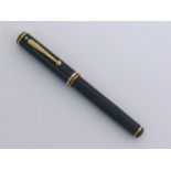 Sheaffer, a dark blue resin fountain pen, with fine 18 carat gold nib, cartridge filler (inked),