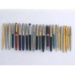 A collection of fourteen fountain pens, including Parker 51 models, and nine other pens and pencils.