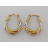 A pair of 9 carat gold ear hoops, the posts fully hallmarked, 3gms