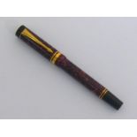 Parker, a burgundy marbled resin fountain pen, with medium 18 carat gold nib, cartridge converter