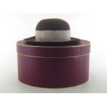 A lady’s light brown wide brim bowler style hat with broad ecru band by Herbert Johnson, New Bond