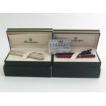 Montegrappa, a silver fountain pen and ballpoint pen set, of chevron design, the fountain pen with