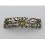 A 19th century gemset silver bar brooch, the open work design centred on a heart motif and