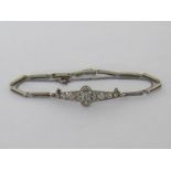 An Art Deco diamond bracelet, the central tapering plaque set with old cut brilliants, the principal