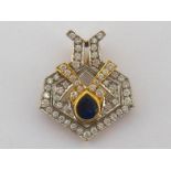 A sapphire and diamond pendant by Herbert Blankstein, the geometric motif collet set to the centre