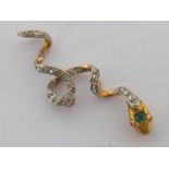 A French 18 carat gold, diamond, emerald and ruby snake pendant, the twisting body set along its