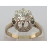 A single stone diamond ring, the modern round brilliant approx. 1.60 carats, raised above an