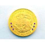 A Tristan da Cunha gold plated silver 2009 five pound coin, uncirculated and in protective case.