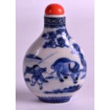 A FINE CHINESE BLUE AND WHITE SNUFF BOTTLE painted with a landscapes & a boy with a buffalo,