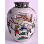 A 19TH CENTURY CHINSESE FAMILLE ROSE VASE Kangxi style, painted with figures on horseback. 9.5ins