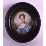 A 19TH CENTURY EUROPEAN IVORY MINIATURE depicting a female in blue robes. 2.25ins x 3.25ins.