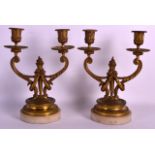 A PAIR OF 19TH CENTURY FRENCH ORMOLU TWIN BRANCH CANDLEABRA with acanthus mounts and marble bases.