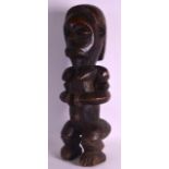 A LARGE EARLY 20TH CENTURY CARVED AFRICAN TRIBAL FERTILITY FIGURE possibly Baule tribe, modelled