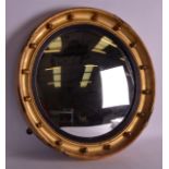 A REGENCY GILTWOOD CIRCULAR MIRROR. 1Ft 6ins diameter.