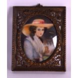 A LATE 19TH CENTURY EUROPEAN IVORY MINIATURE depicting a female wearing a summer hat. 2.5ins x 3.