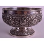 A 19TH CENTURY INDIAN WHITE METAL REPOUSSE BOWL decorated with flowers and scrolls. 251 grams. 5.