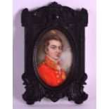 A 19TH CENTURY EUROPEAN IVORY MILITARY MINIATURE contained within a fine ebonised frame. 2Ins x 3.