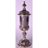 A 19TH CENTURY HUNGARIAN SILVER CUP AND COVER. 12Ins high.