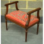 A GOOD WILLIAM IV UPHOLSTERED WINDOW SEAT with acanthus decoration and reed tapering legs.