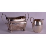 A REGENCY IRISH TWIN HANDLED SILVER SUGAR BASIN Dublin 1811, together with a George V milk jug. 331&