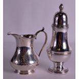 A CONTINENTAL SILVER SUGAR SIFTER together with a white metal jug. 7.5ins & 5.5ins high. (2)