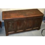 AN 18TH CENTURY ENGLISH OAK COFFER with rising top. 4Ft 6ins wide.