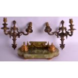 AN EARLY 20TH CENTURY FRENCH GILT METAL AND ONYX DESK STAND overlaid with swags, together with a