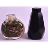 AN UNUSUAL EARLY 20TH CENTURY CHINESE CARVED BEIJING GLASS SNUFF BOTTLE of dark purple colour,