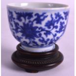 A 19TH CENTURY CHINESE BLUE AND WHITE MINIATURE BOWL bearing Yongzheng marks to base painted with