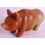 A LATE 19TH/20TH CENTURY CHINESE CARVED JADE MODEL OF A PIG Qing, boldly modelled upon all fours.