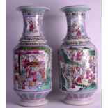 A LARGE PAIR OF CHINESE CANTON FAMILLE ROSE VASES 20th Century, painted with scholars and foliate