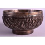 A SMALL 19TH CENTURY PERSIAN WHITE METAL BOWL decorated in relief with animals and figures. 186