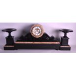 A 19TH CENTURY FRENCH BLACK AND PINK MARBLE CLOCK GARNITURE with white enamel dial. Mantel 2ft