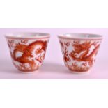 A PAIR OF CHINESE IRON RED PORCELAIN TEABOWLS Tongzhi mark and possibly of the period, decorated