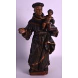 AN 18TH CENTUR EUROPEAN POLYCHROMED FIGURE OF A SAINT. 12.5ins high.