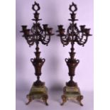 A PAIR OF 19TH CENTURY FRENCH ONYX AND GILT CANDLEABRA. 2Ft high.