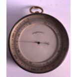 A SMALL VICTORIAN POCKET BAROMETER brass bound with white painted dial. 3Ins diameter.