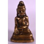 AN 18TH/19TH CENTURY SOUTH EAST ASIAN BRONZE BUDDHA modelled upon a triangular base. 4.25ins high.