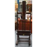 A FINE VICTORIAN ARTISTS EASEL with brass inlay and adjustable features. 6Ft high unextended.