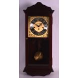 A REPRODUCTION ACCTIM HANGING WALL CLOCK with brass dial. 2Ft 3ins high.