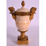 A LOVELY EARLY 19TH CENTURY FRENCH IVORY VASE AND COVER ormolu mounted with rams mask heads and a