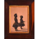 AN EARLY 19TH CENTURY SILHOUETTE contained within a walnut frame. Image 9ins x 6ins.