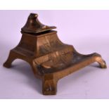 AN ART NOUVEAU BRONZE DESK STANDING INKWELL all over decorated with motifs. 7Ins wide.