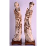 A PAIR OF EARLY 20TH CENTURY CHINESE CARVED IVORY FIGURES depicting a male and female, overlaid with