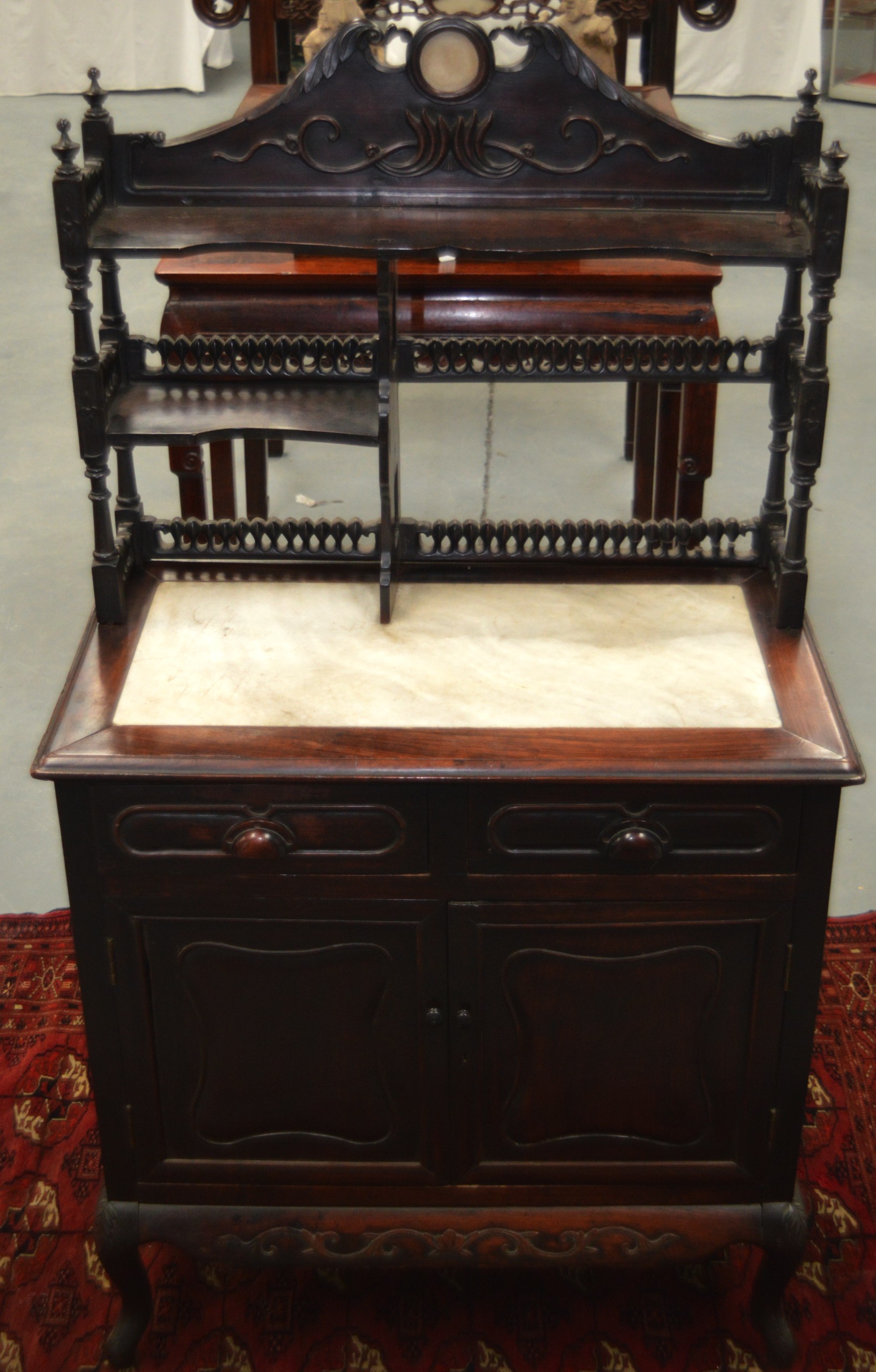 A 19TH CENTURY CHINESE CARVED HARDWOOD AND MARBLE 'EUROPEAN' CABINET with acanthus carved type