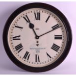 AN UNUSUAL VINTAGE WWII MILITARY CLOCK C1940 with bakelite surround and carved wooden backing.