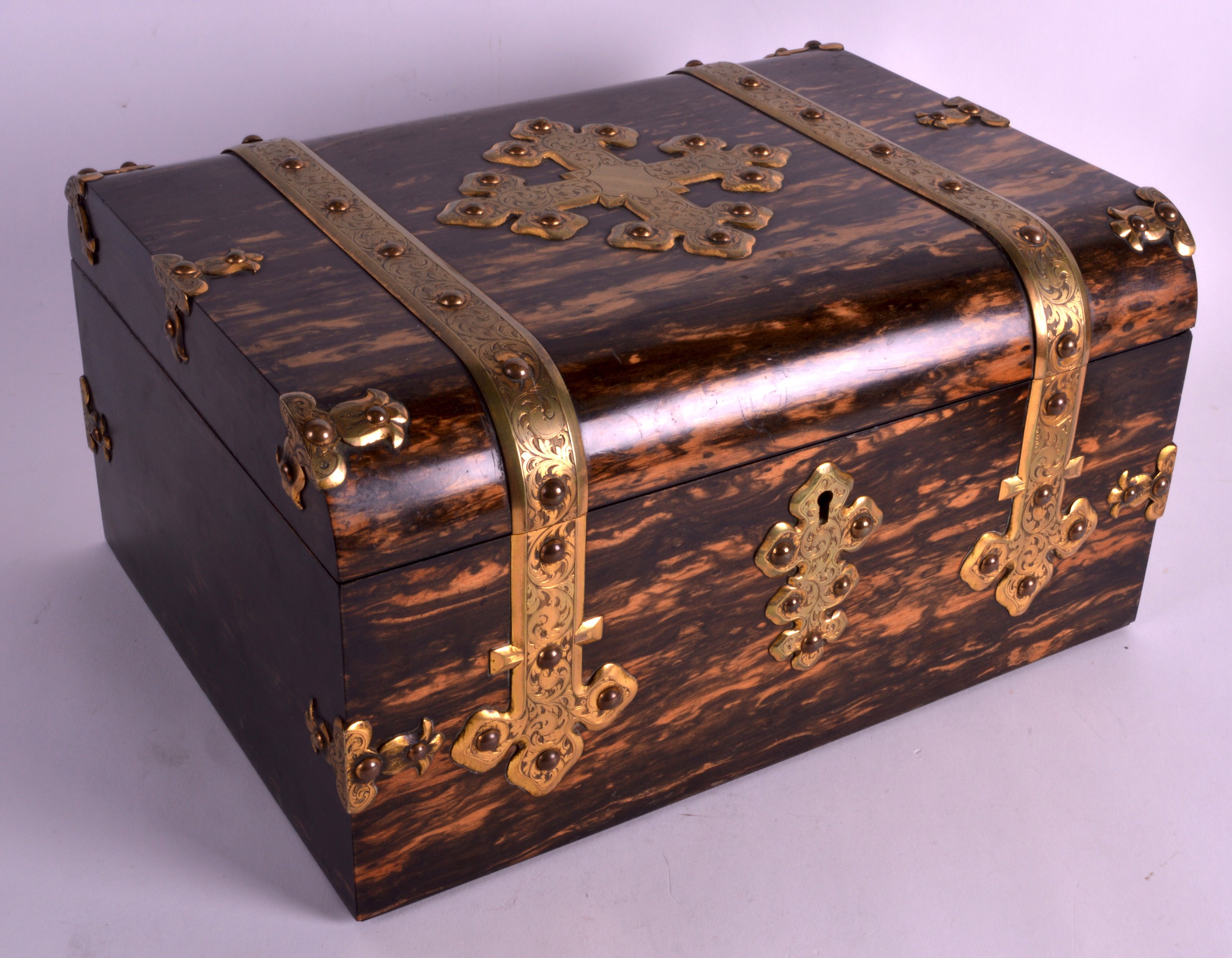 A FINE MID 19TH CENTURY ENGLISH COROMANDEL GAMING BOX overlaid in bronze with gothic straps, the top